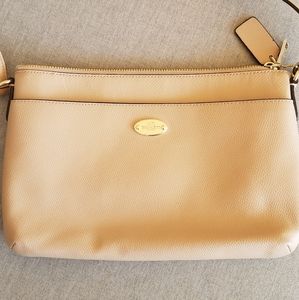 Tan Coach crossbody bag